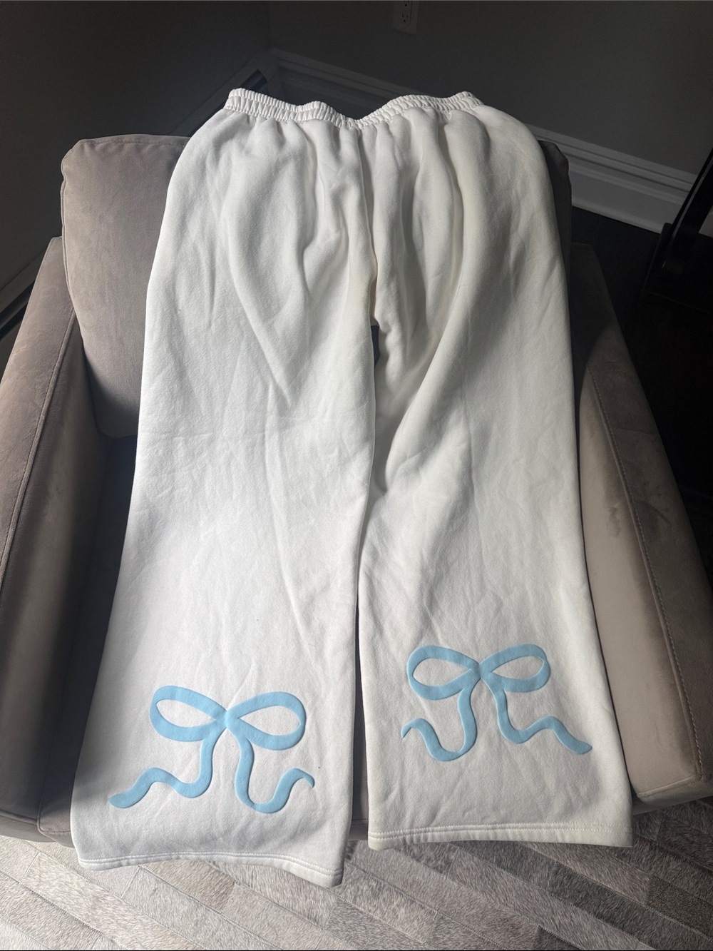 Edikted White Wide Leg Sweatpants with Light Blue Bow Detail on back